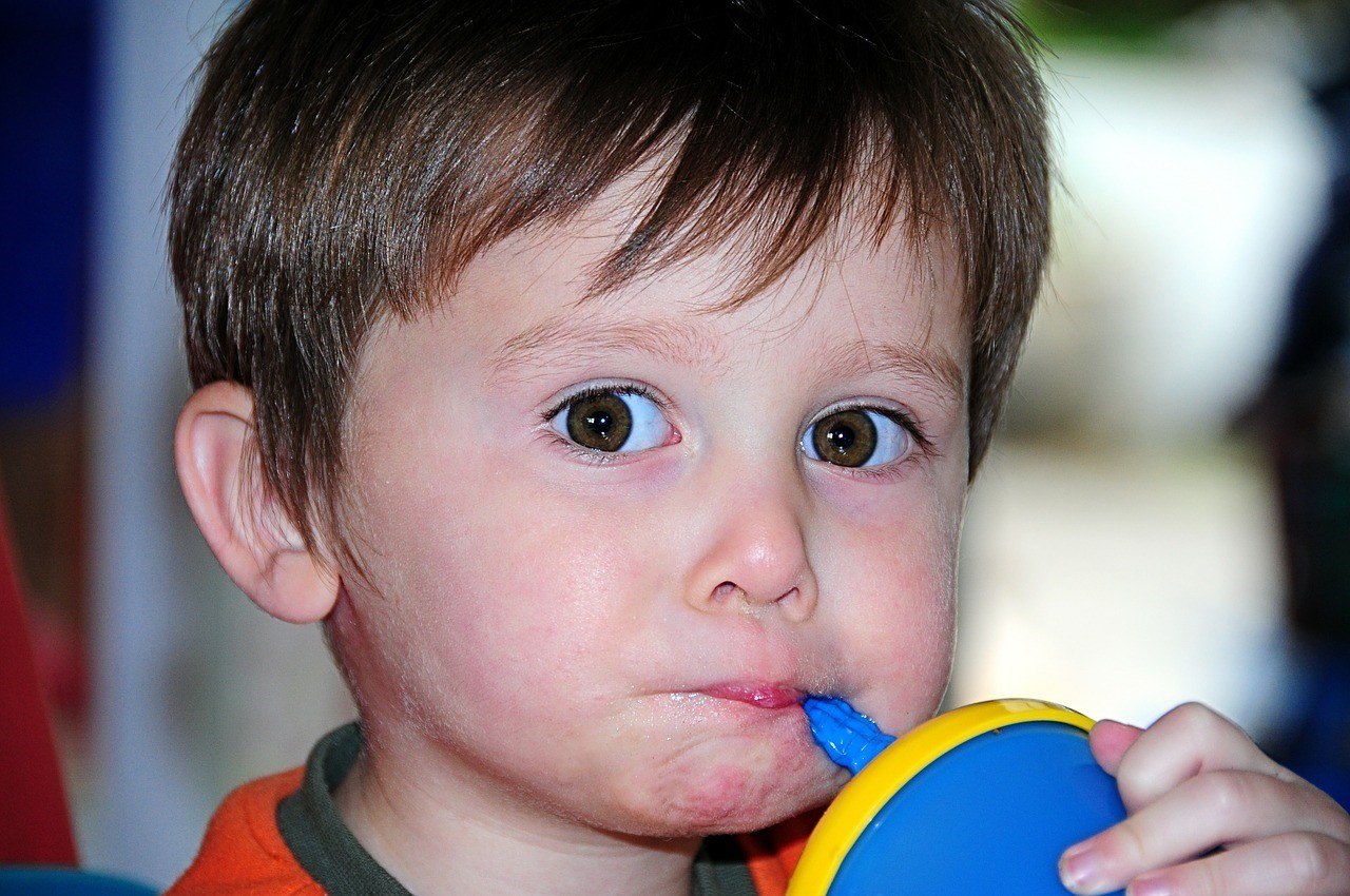 When Should a Toddler Drink from an Open Cup? And other Cup Drinking  Milestones — Ability Innovations