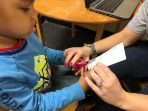ABC Pediatric Therapy Cutting Paper using Fine Motor Skills