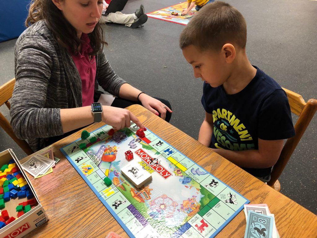 ABC Pediatric Therapy Playing Monopoly