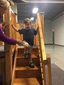 ABC Pediatric Therapy Boy climbing down stairs