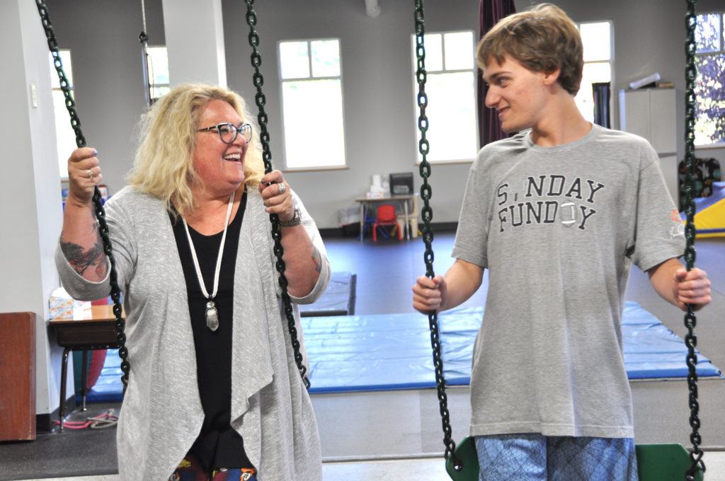 ABC Pediatric Therapy Teacher and Student on Swing
